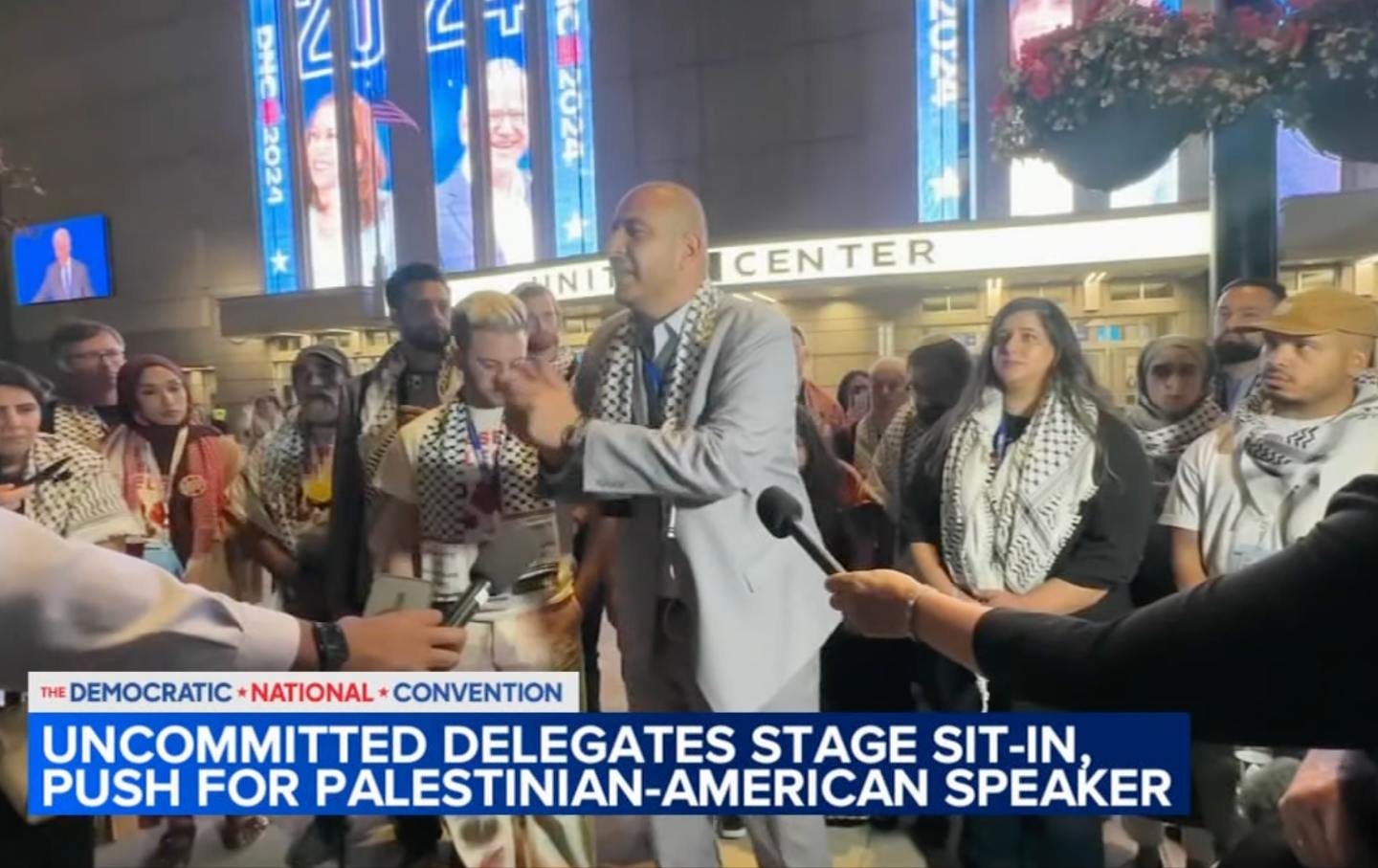 Uncommitted delegates stage a sit-in outside the United Center in Chicago on August 21, 2024.